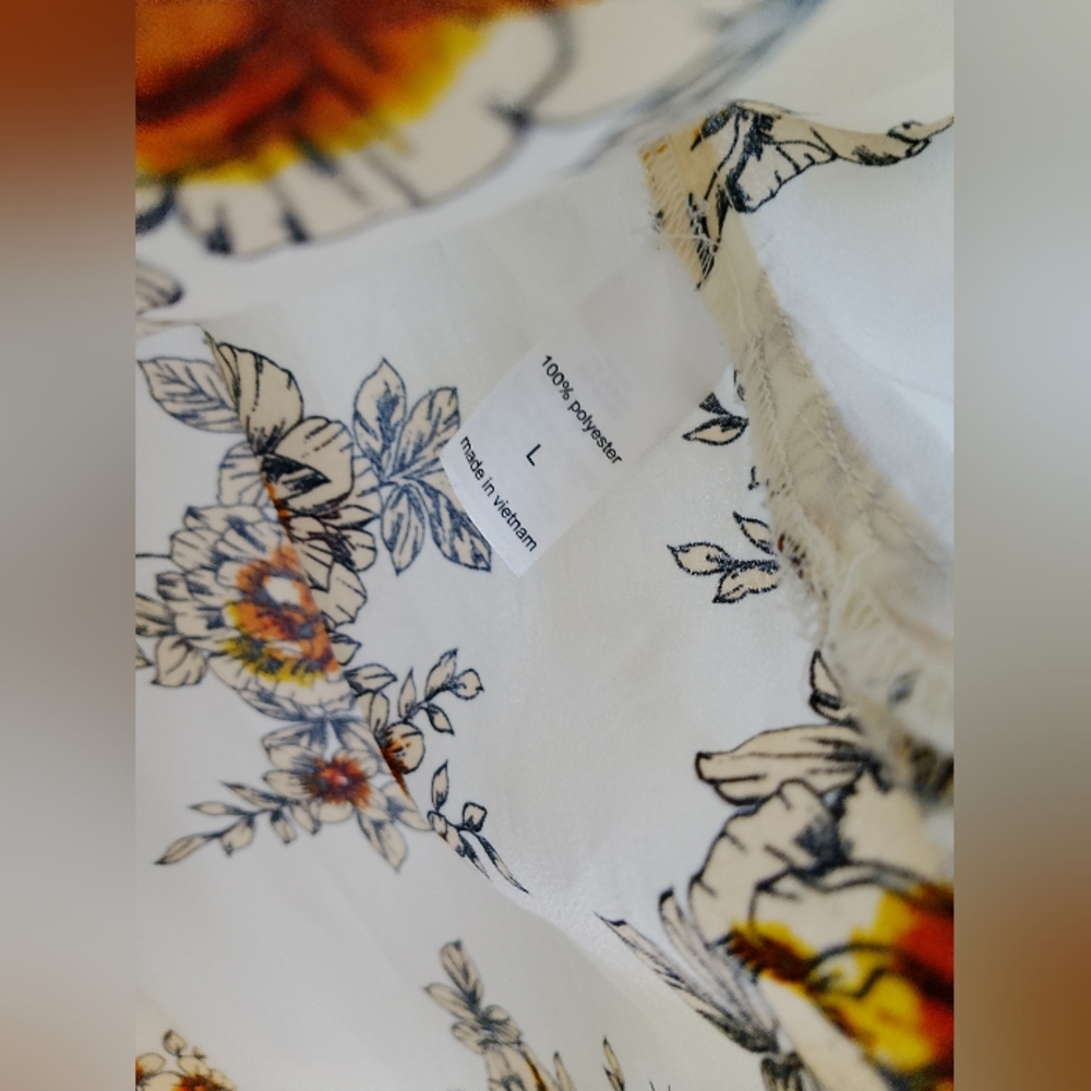 Maurices Floral Print Top with Orange and Black Accents - Picture 7 of 7